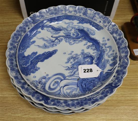 A Japanese Wan Li blue and white plate, a pair of scalloped plates and an Imari plate